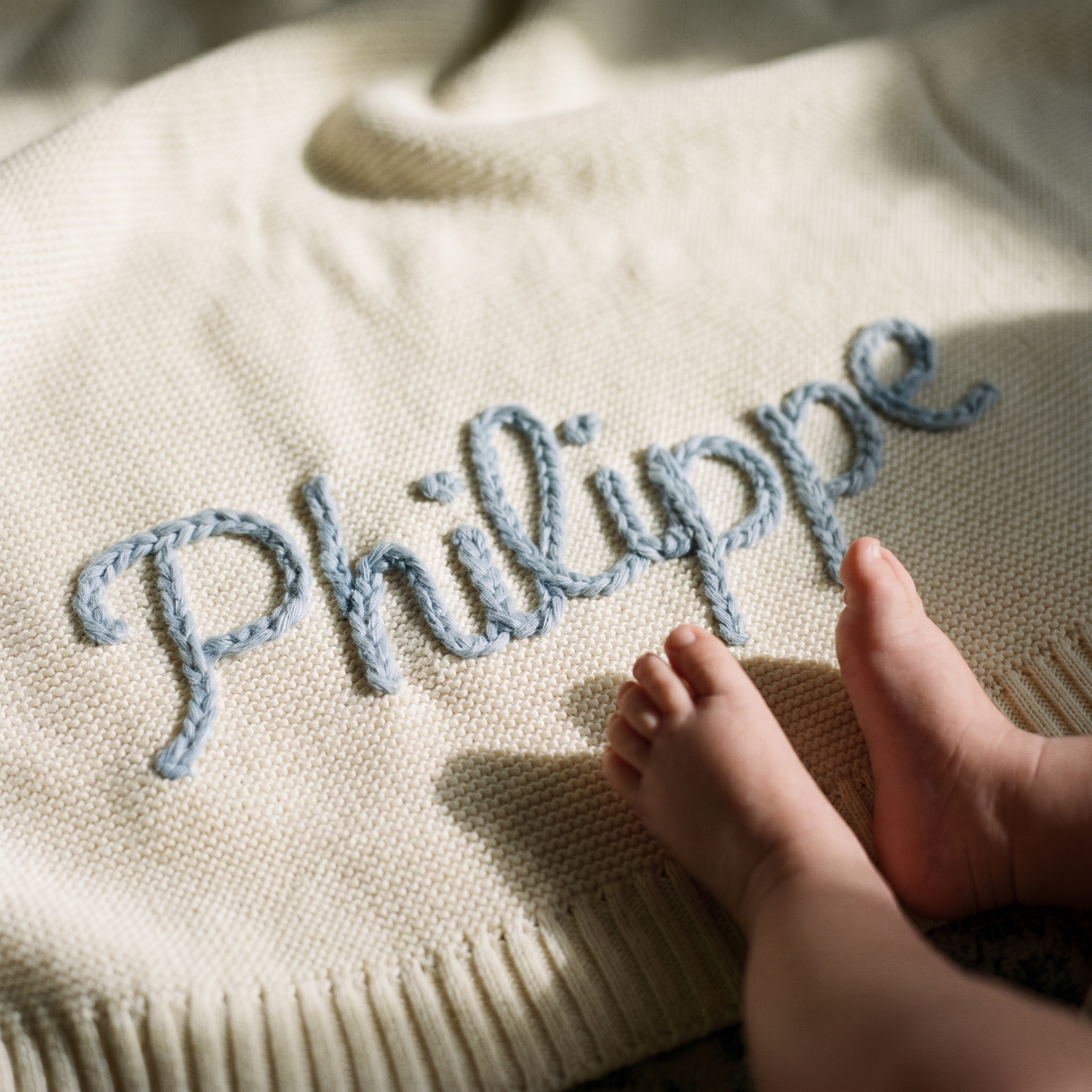 Handgestrickte personalisierte Decke