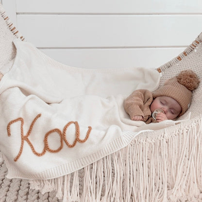 Handgestrickte personalisierte Decke